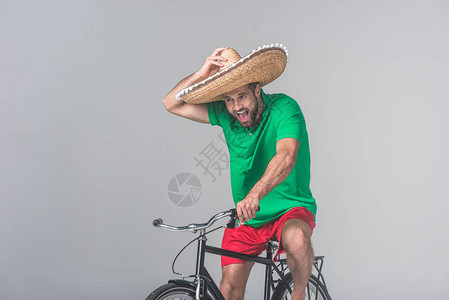 骑着灰色自行车的墨西背景图片
