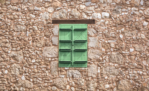 绿色百叶窗和垃圾墙背景背景图片