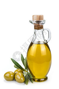 白底隔离在玻璃瓶中的橄榄油和图片