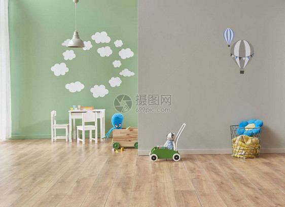 灰色和绿色墙装饰现代婴儿房以及室内各种婴儿用品床柜和玩具图片