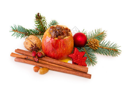 肉桂烤苹果圣诞作文烤苹果与孤立的白色背景图片