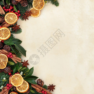 圣诞背景与干果和肉桂香料的交界处图片
