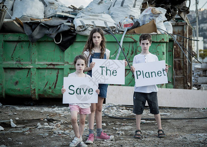拯救地球年轻孩子持有保护地球的标志背景图片