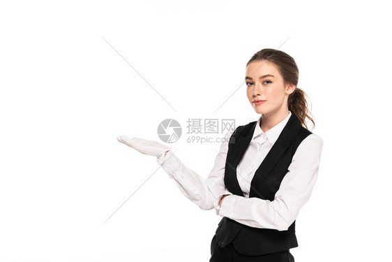 身着正式穿戴和白手套的年轻女服务员图片