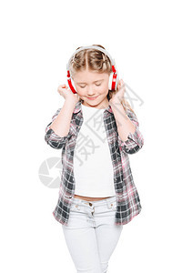 可爱的小女孩在耳机里监听音乐图片
