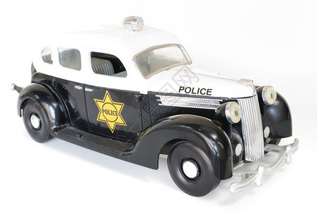 孤立的老式微型警车背景图片