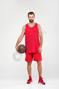 红运动装篮球运动员带球图片
