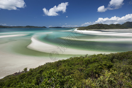 从澳大利亚昆士兰州Whitsunday岛的HillIntlet水和滚图片