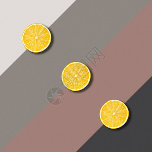 彩色背景三片柠檬的抽象图像图片