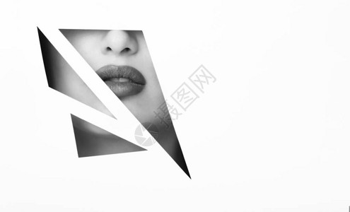 几何纸框透出的化妆女性背景图片