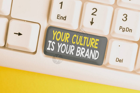 概念手写显示你的文化就是你的品牌概念意义知识体验是一张演示卡白色pc键盘图片
