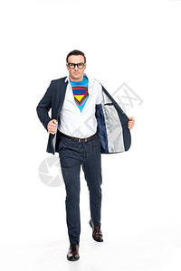 自信的商人穿着西装下的超级英雄服装图片