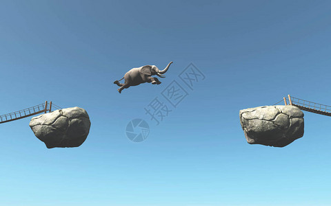 大象跳过两块岩石之间的隔阂图片