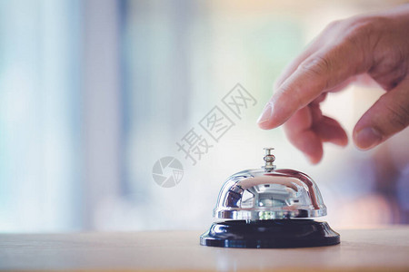 柜台上的铃可以用手服务敲钟图片
