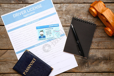 驾照附有申请表护照和木本笔记背景图片