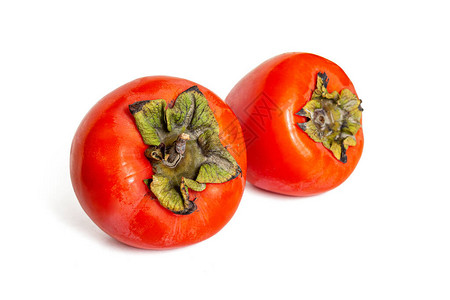 黑芝麻红枣两种每西门水果橙色的橙色绿色叶背景