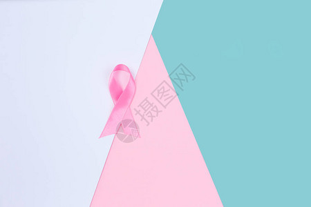 乳腺癌概念彩色背景的乳腺癌粉红丝图片