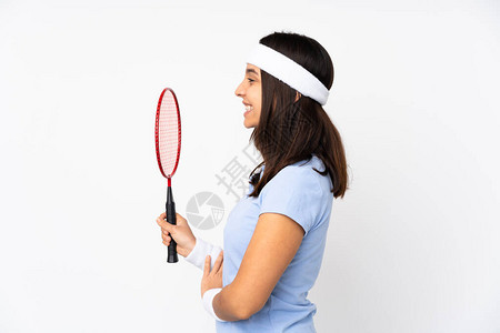 年轻羽毛球女玩家在孤立的白色背景上图片