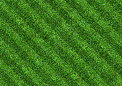 绿色的足球场背景有抽象模式图片