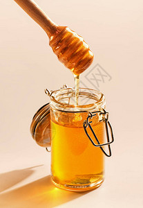 蜜糖加蜂蜜和棍图片