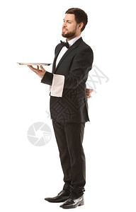 白色背景上的英俊男服务员图片