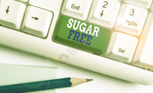 显示无糖的文字符号包含人工甜味物质而不是糖的商业照片文本白色pc键盘图片
