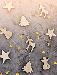 木制背景的装饰玩具圣诞概念背景图片