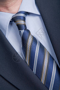商人细节特写夹克男式衬衫配蓝色领带图片