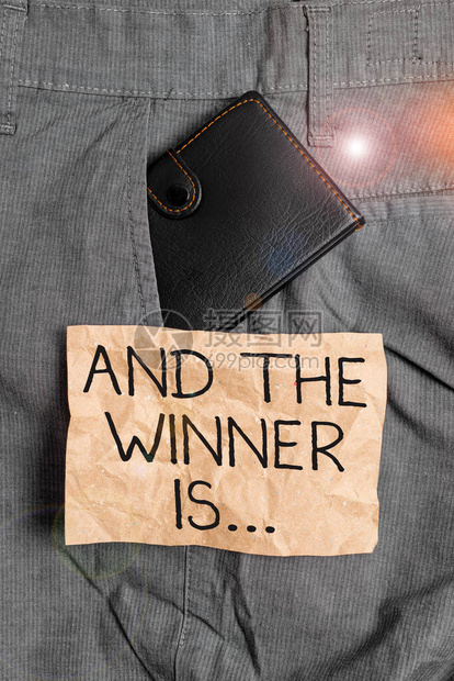 文字书写文本和赢家是商业照片展示宣布展示或赢得某些东西的东西男裤前口袋里的小钱图片