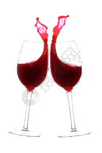两杯红酒用大喷溅的烤面包手势图片