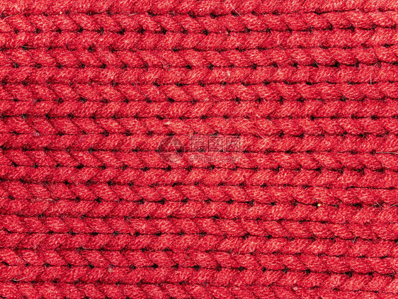 红色羊毛编织布的纹理背景图图片