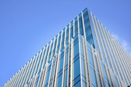 蓝玻璃现代建筑摩天大楼的抽象图片