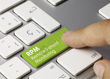 RPM远程病人监护绿色键盘上的铭文远程病人监测写在金属键盘的绿色键图片