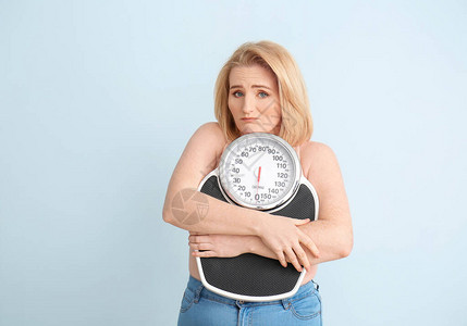重量过重有色背景称号的超重胖妇女图片
