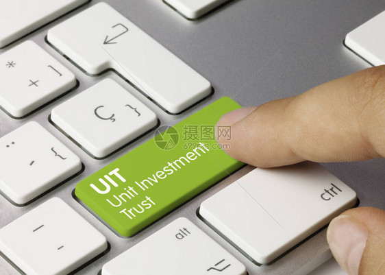 UIT单位投资信托公司撰写的关于金属键盘绿键手图片