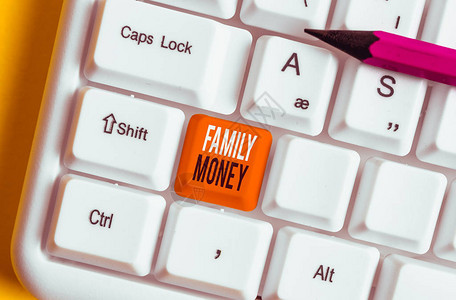 手写文本家庭钱概念照片继承了已建立的上层家庭的财富白色pc键盘图片