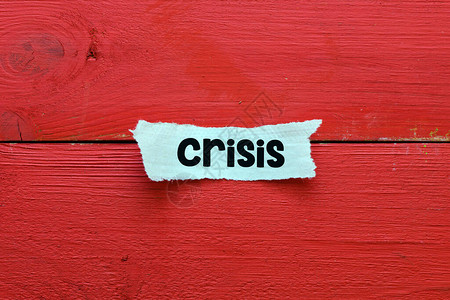 CRISIS以纸面文字写成的经济危图片