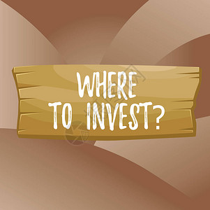 手写文本在哪里投资问题概念照片询问将资金投入金融计划或股票的地方木板空白矩形状的木头附加颜色背景图片
