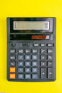 黄色背景的黑计算器图片