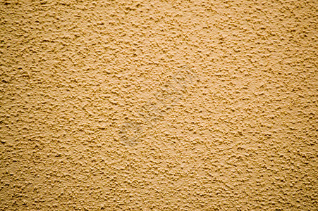 黄色粗糙的墙壁装饰着石棺的建筑图片