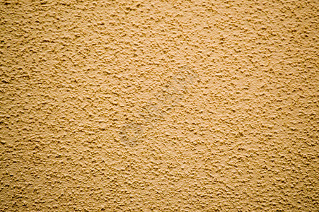 黄色粗糙的墙壁装饰着石棺的建筑图片
