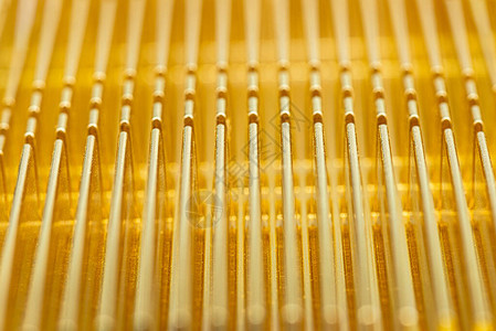 现代设计宏图拍摄的金色散热器所制成的背景是电脑图片