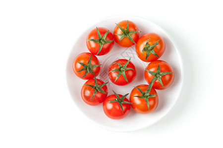 新鲜樱桃西红柿在盘子图片