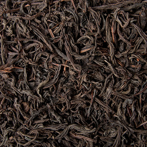 红茶散干茶叶背景图片