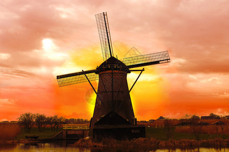 日落时的风车荷兰风景背景图片
