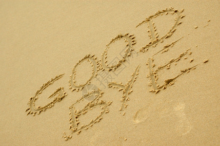 写在沙滩上的再见三个字背景图片