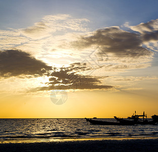 亚洲在khotao湾小岛日落太阳泰国和南海图片