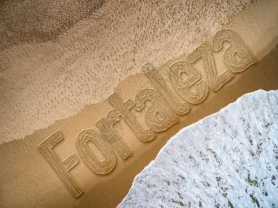 写在海滩背景上的福塔莱萨背景图片