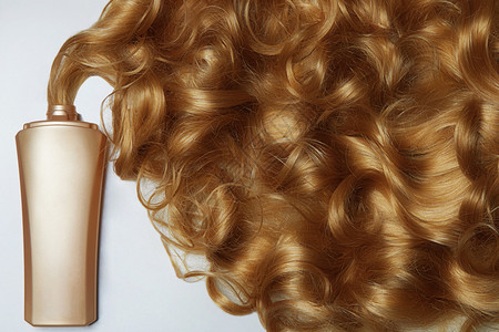 美丽的金发美妙的头发美丽的静物化妆品卷曲的健康头发图片