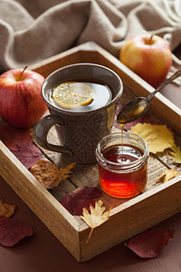 热柠檬蜂蜜茶变暖的茶饮料围巾背景图片